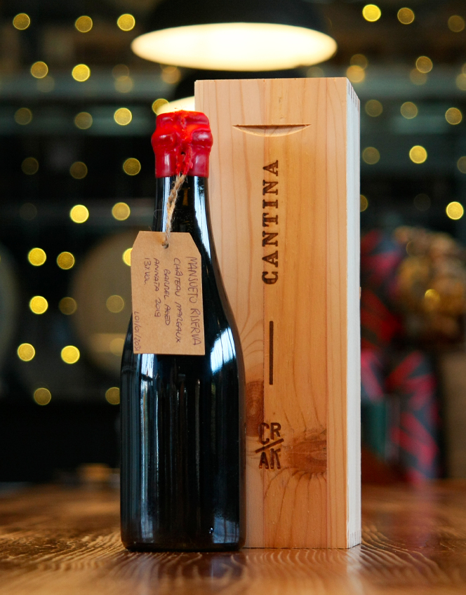 Bottiglia Cantina Mansueto Riserva 2019 - Chàteau Margaux Barley Wine con cassa in legno